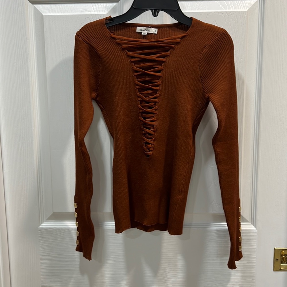 Deep brown, long sleeve sweater with gold button details